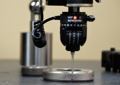 CMM quality control tool used to measure dimensions.