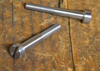 Specialized manufacturing of small threaded fasteners